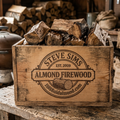 Wooden crate filled with wood chunks from Steve Sims Almond Firewood on a wooden table.